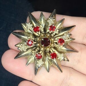 Vintage 1950s Red Rhinestone Starburst Brooch Gold Tone Fleur de Lis